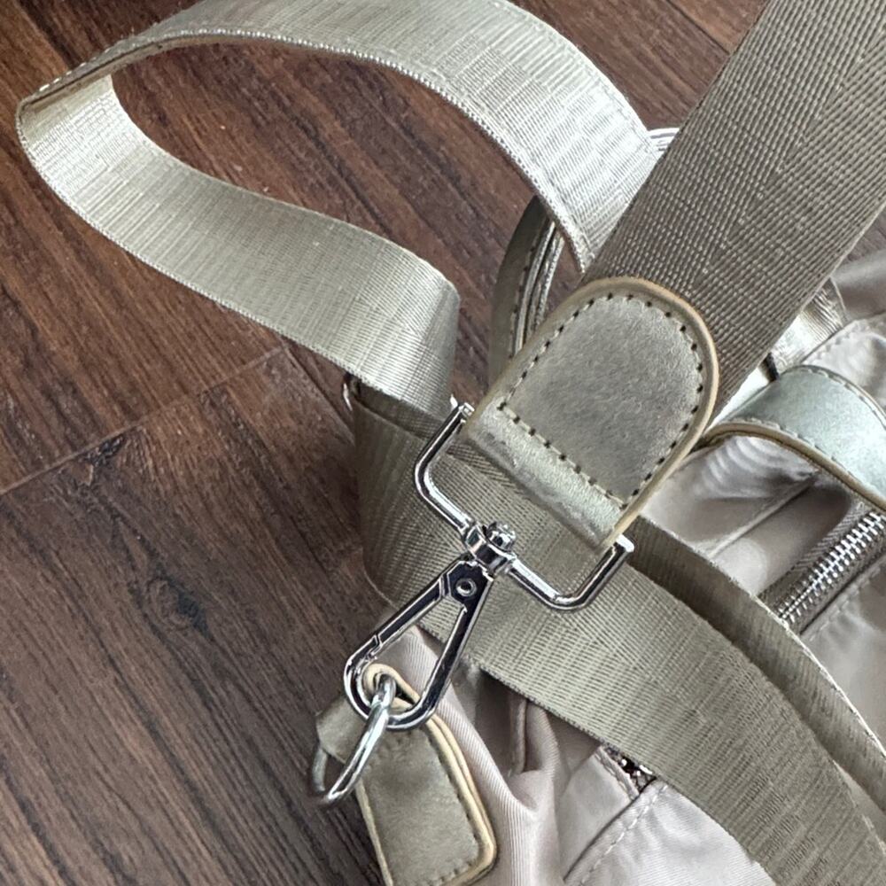Neutral Taupe Woman’s Backpack with Metallic Accent and many zipper pockets. - Picture 5 of 13